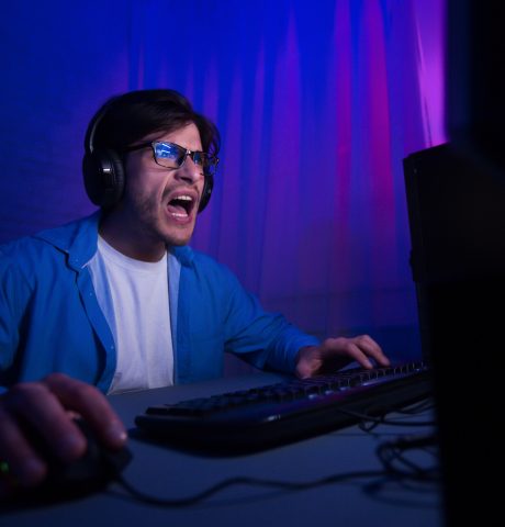 emotional-gamer-playing-video-game-online-and-shou-2021-08-30-02-27-22-utc