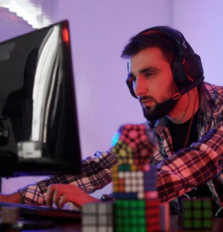 portrait-of-young-bearded-pro-gamer-playing-in-onl-2021-08-30-08-05-29-utc