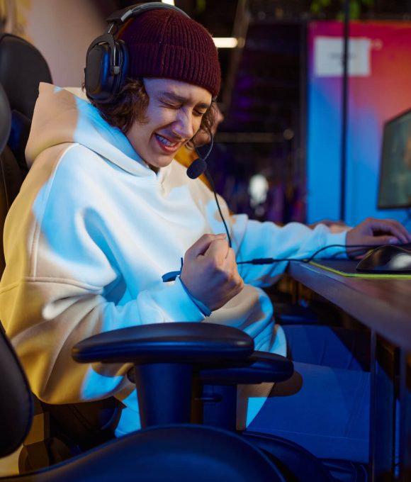 young-gamer-in-headphones-play-in-game-club-2021-09-03-06-00-30-utc